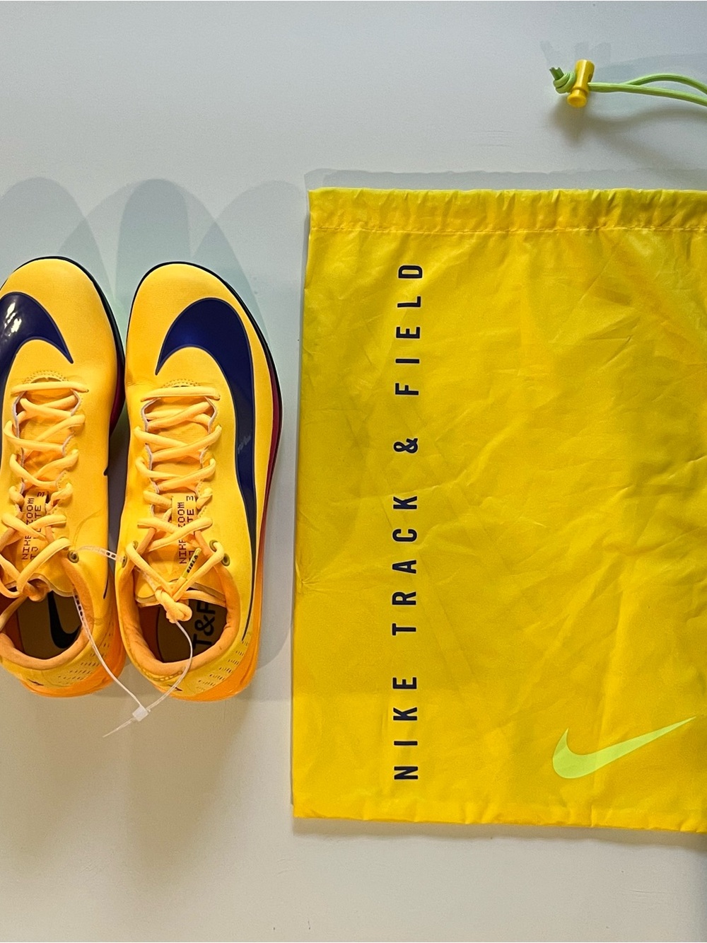 Nike Yellow Track & Field Spikes with Navy Swoosh